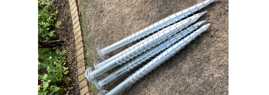 Ground screws for solar panel mounting