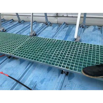 Durable fiberglass walkway for rooftop solar panels